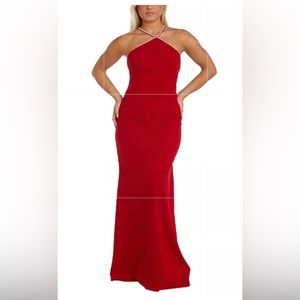 A long red dress with mini diamonds in a cross cross top along the neck